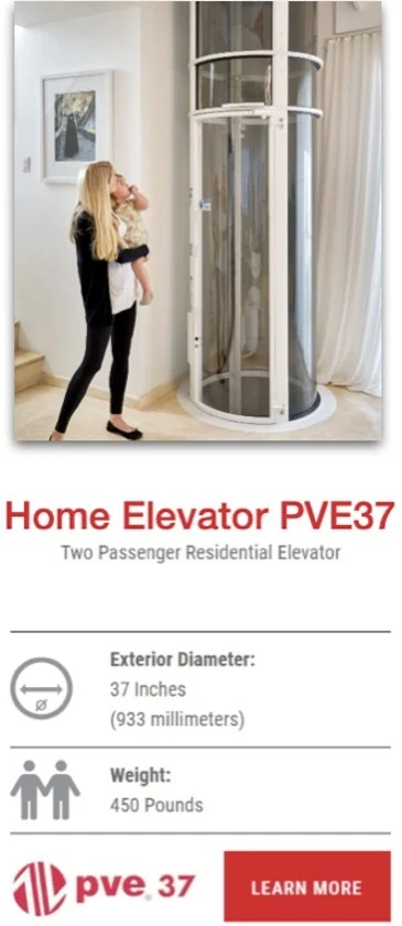 Mother carrying child beside the PVE37 glass vacuum elevator in a home
